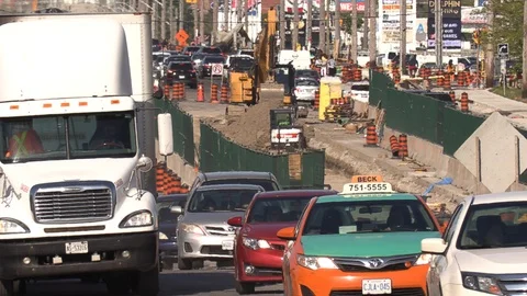 Road construction and traffic gridlock in Toronto Stock Footage 109414245