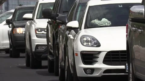 Road construction and traffic jam gridlock on hot summer day on city street Stock Footage 131210992