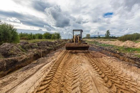Road Construction and working of the construction machinery. Stock Photos