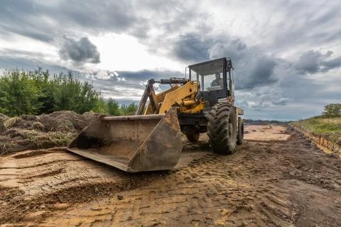 Road Construction and working of the construction machinery. Stock Photos