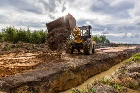 Road Construction and working of the construction machinery. Stock Photos