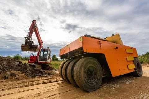 Road Construction and working of the construction machinery. Stock Photos