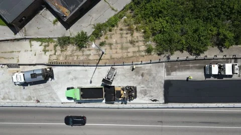 Road Construction - Asphalt Paving with Quick Zoom In Stock-Footage 250020535