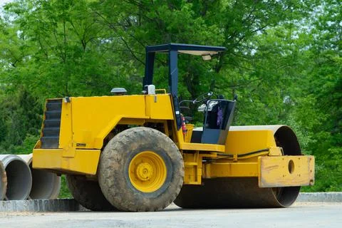Road construction asphalt rolling machine hot Stock Photos