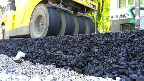 Road Construction. Compactor roller at asphalting work Stock Footage 89154903