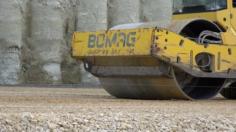 Road Construction. Compactor roller at asphalting work, close up Stock Footage 97705716