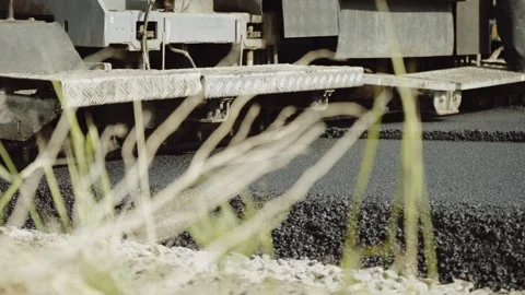 Road Construction Crew Paving Fresh Asphalt in Small Town Stock-Footage 329509661