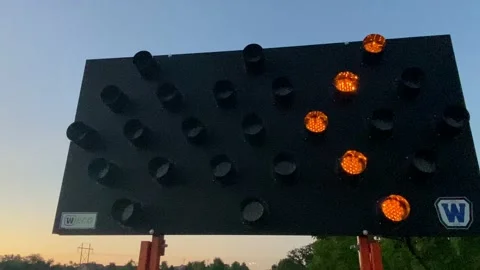 Road Construction - Flashing Arrows, Close Up of Orange Lights Stock Footage 201619593