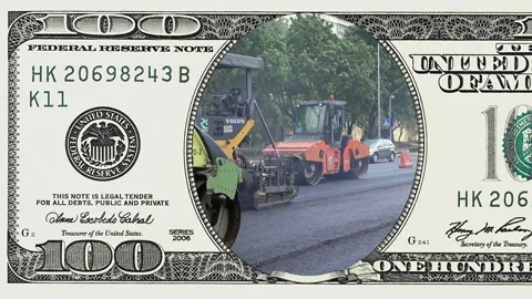 Road construction in frame of 100 dollar bill Stock Footage 96395400