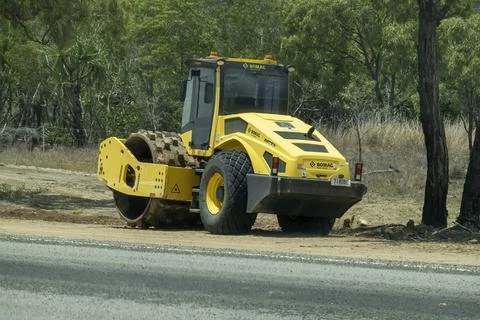 Road Construction Heavy Machines On Work Site Stock Photos