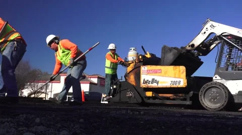 Road Construction, mechanical asphalt spreader Stock Footage 45667357