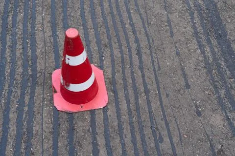 Road construction or repair - laying a new layer of asphalt, marking the leve Stock Photos