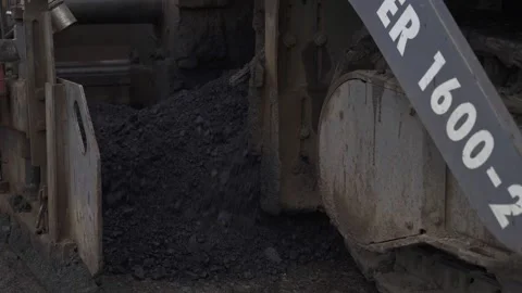Road construction. Paver is laying new hot asphalt. closeup asphalt Stock Footage 145466027