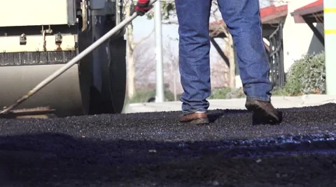 Road Construction, raking and rolling , steam Stock Footage 45667200