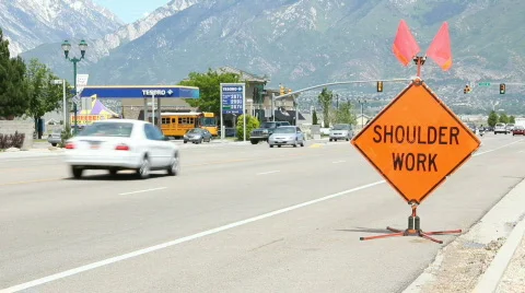 Road construction shoulder work sign  Stock Footage 740257