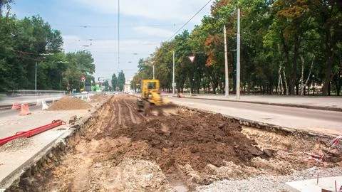 Road construction site with tram tracks repair and maintenance timelapse. Stock Photos