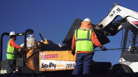 Road Construction, spraying asphalt binder Stock Footage 45667190