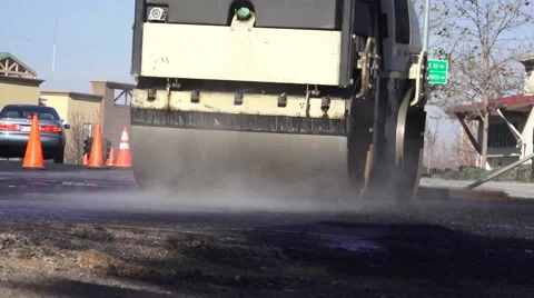 Road Construction, steaming asphalt ,roller Stock Footage 45667214