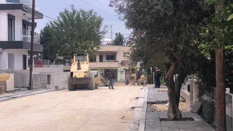 Road Construction In The Street. Steamroller's Working Stock Footage 122946855