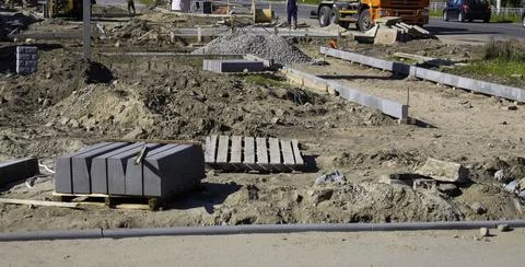 Road Construction Using Concrete and Metal in Summer Stock Photos