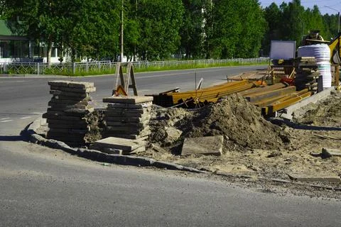 Road Construction Using Concrete and Metal in Summer Stock Photos