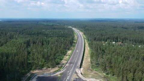 Road construction work. Shooting from the air on a drone road with a new asphalt Stock Footage 139818481