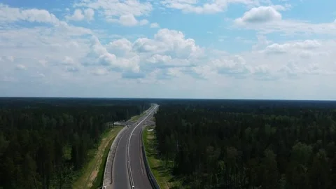 Road construction work. Shooting from the air on a drone road with a new asphalt Stock Footage 139921423