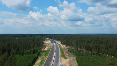 Road construction work. Shooting from the air on a drone road with a new asphalt Stock Footage 139968090