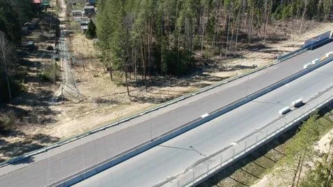 Road construction work. Shooting from the air on a drone road with a new asphalt Stock Footage 140269880