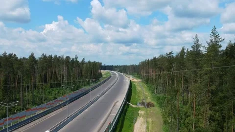 Road construction work. Shooting from elevating drone of the road with a new 스톡 동영상 140197390