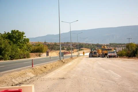 Road construction, work vehicles Stock Photos