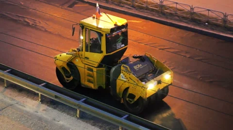 Road construction works in the evening Stock Footage 40701323