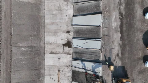 Road construction. Yellow tractor and builders Stock Footage 246792175