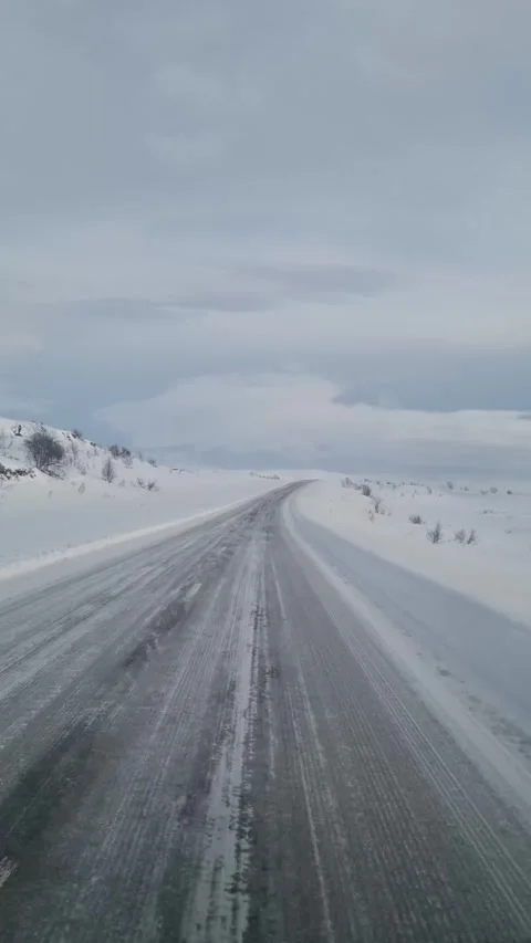 Road covered in ice and snow in Finland Stock Footage 319850815