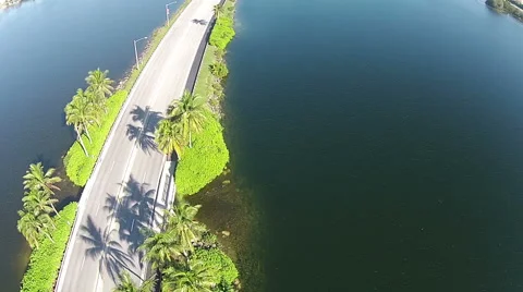 Road crossing lakes Stock Footage 47449984