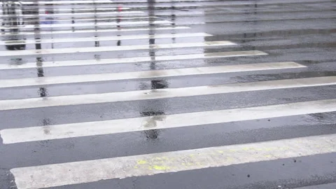 Road crossing in the rain Stock Footage 138901907
