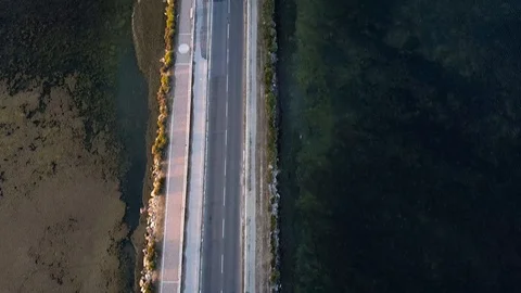 Road crossing the sea Stock Footage 122848027