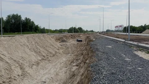 Road with crushed stone on the road under construction Stock Footage 306168065