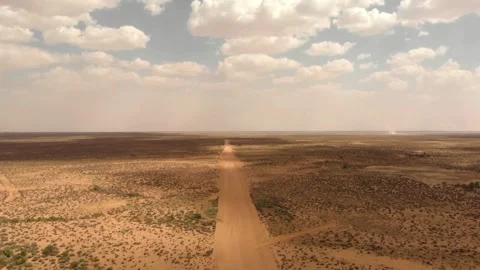 Road cutting through a desert landscape Stock-Footage 278013945