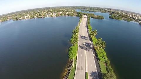 Road cutting thru lakes Video stock 46449923