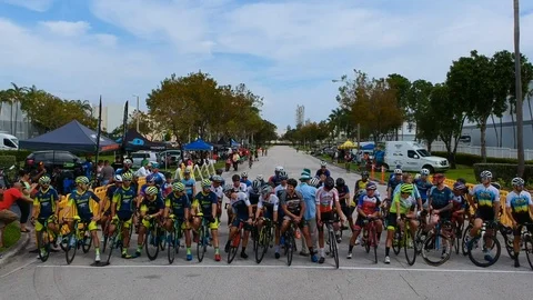 Road Cyclists getting ready for the race Stock Footage 104773662