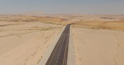 A road in the Desert - Aerial Stock Footage 112996589