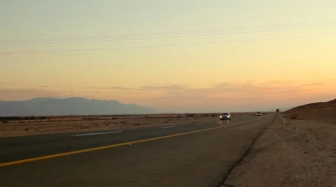 Road in the Desert- tilt down from sky Stock Footage 10579907