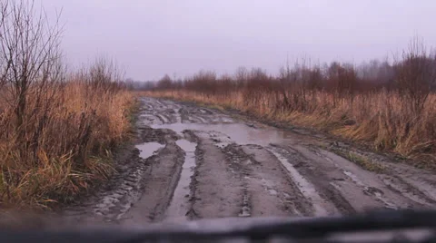 Off-road dirt, puddles of rain Stockbeeldmateriaal 36385863