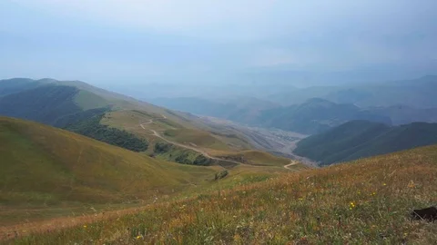 Road down the valley Stock Footage 95545540
