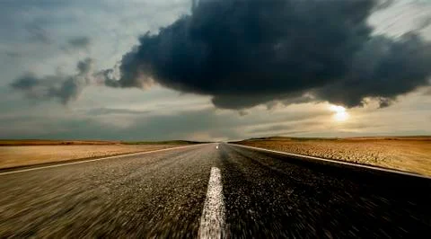 Road with dramatic sky Stock Photos