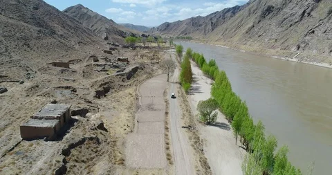 Off Road Driving Besides the Yellow River in China Stock Footage 107640092