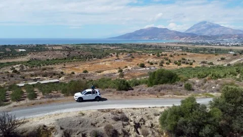 Off Road Driving in Crete. Getting Lost. Car, Olive Trees and Sea. Greece Stock Footage 330482183