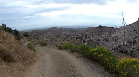 Off-road driving down steep and rough high-desert mountain trails. Stock-Footage 36775897