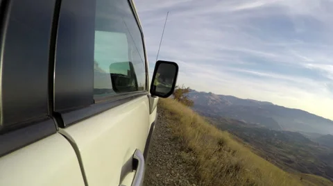 Off-road driving on a mountainous road Stock Footage 61629423